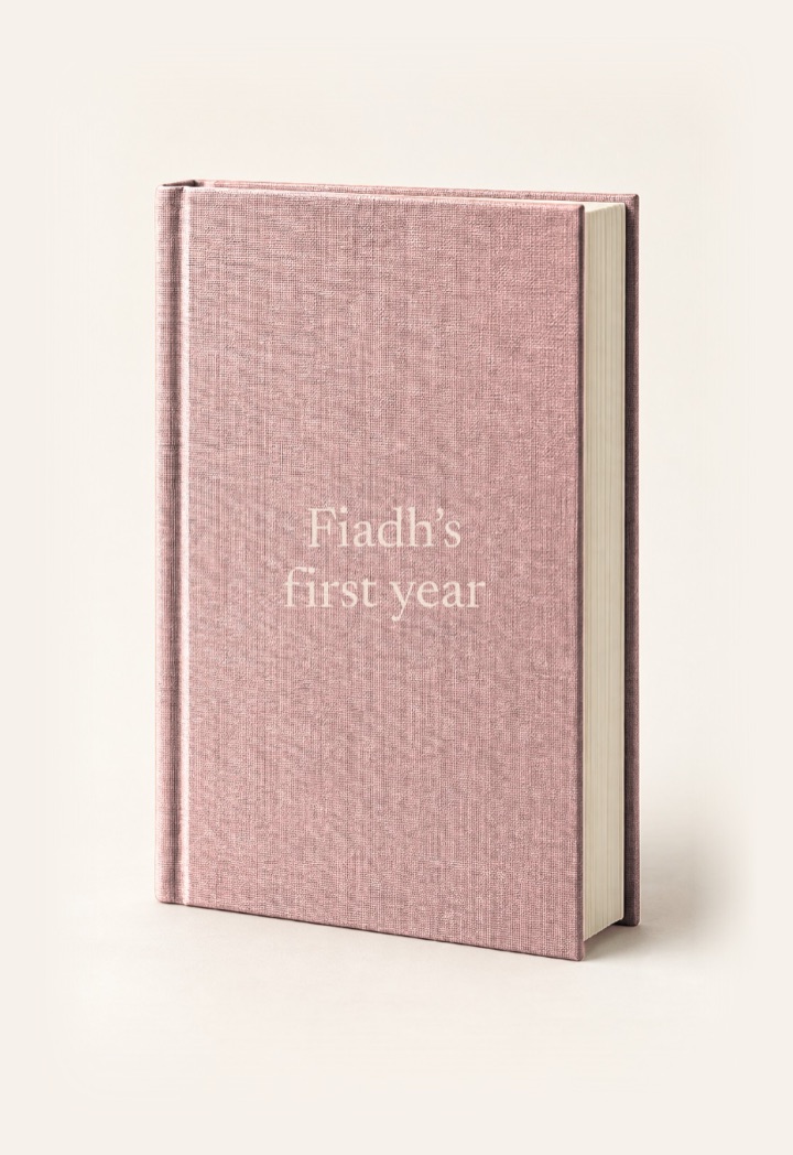 The cover of Fiadh’s first year, a hardcover in Blush with its title on the front.